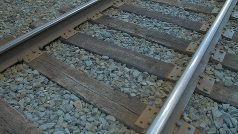 Following train tracks close over top Stock Footage 94119562