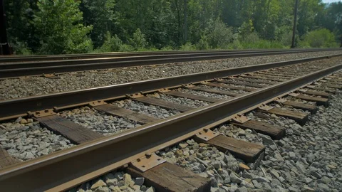 Following train tracks from the side day 動画素材 94119869