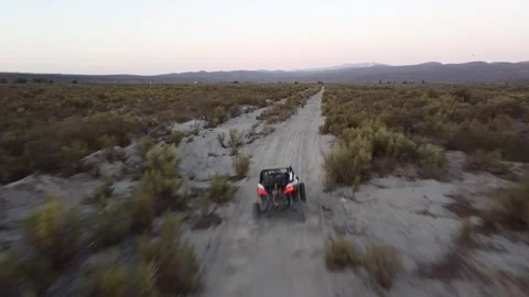 Following UTV through desert Stock Footage 166662410