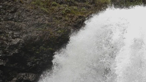 Following Waterfall in super slow motion Stock Footage 100934401