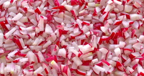 Food background made of thinly chopped radishes. 스톡 동영상 334564681