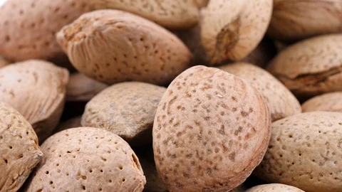 Food background, rotating almonds Vídeo Stock 87705424