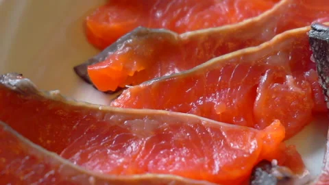 Food background. slices of cooked red fish close-up Stock Footage 139583338