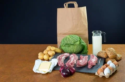 Food for basic needs. Unusual underground made of rusty stainless steel. Copy Foto stock