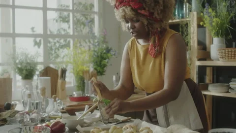 Food Blogger Adding Cheese to Buns before Baking Stock Footage 205890541