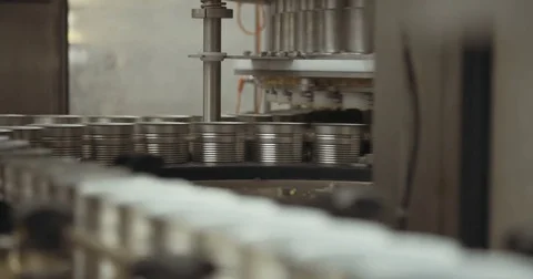Food cans on conveyor in a large processing factory  Stock Footage 78032507