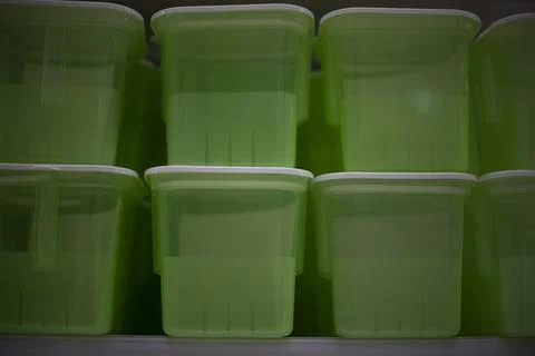 Food containers in store. Plastic boxes. Food storage tanks. Plastic objects. 写真素材
