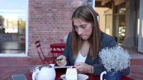 Food critic reviews notes before completing a professional cafe evaluation Stock-Footage 345028504