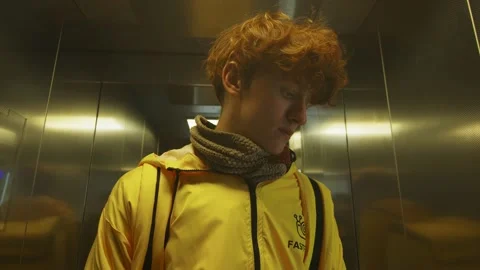 The food delivery man in the elevator Stock Footage 236902307