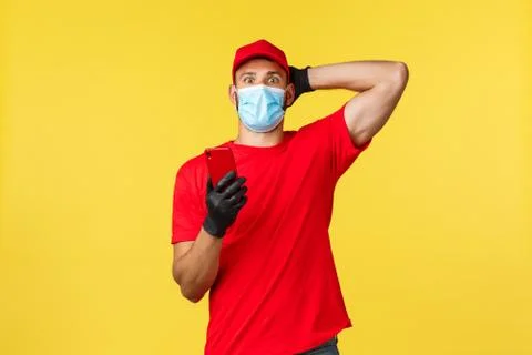 Food delivery, tracking orders, covid-19 and self-quarantine concept. Impressed Foto stock