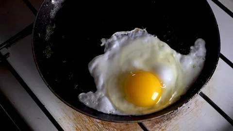 Food; kitchen; breakfast; hot; egg; cooking; break;close up, slow motion Stock Footage 101024395