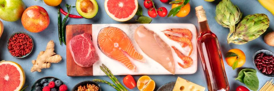 Food, panoramic top-down shot. Meat, fish, chicken and shrimps, vegetables and Fotos Stock