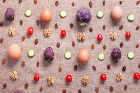 Food pattern of eggs and vegetables on a juta bag Stock Photos