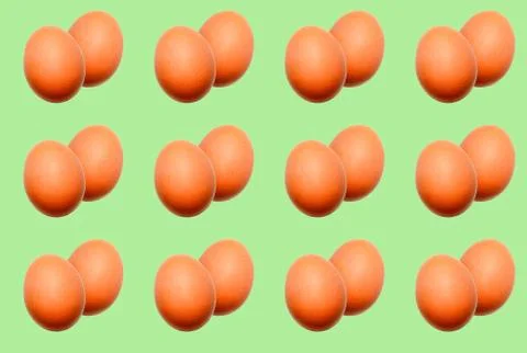 Food pattern of a pair of whole eggs on a green background. Stock Illustration