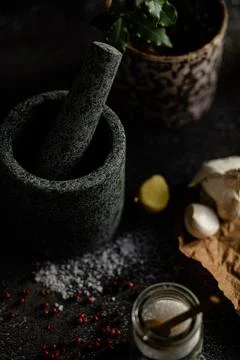 Food photography : mixing spices and herbs in a mortar and pestle Stock Photos