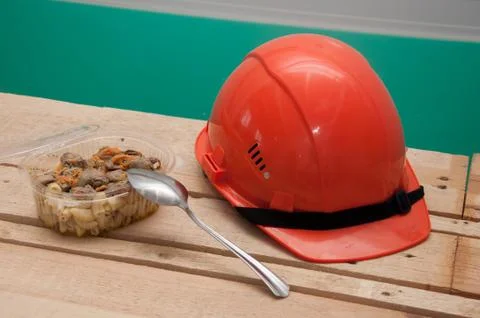 Food in a plastic container. Construction worker's lunch break Stock Photos