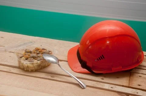 Food in a plastic container. Construction worker's lunch break Stock Photos