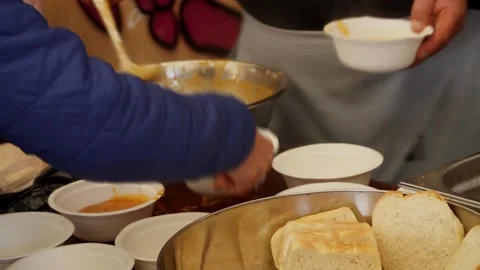 Food for the poor distributed in the street Vídeo Stock 237551649