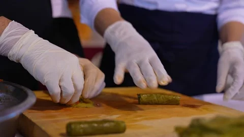 Food Preparation in Kitchen – Stuffed Vegetable Rolling Process Stock Footage 333740637