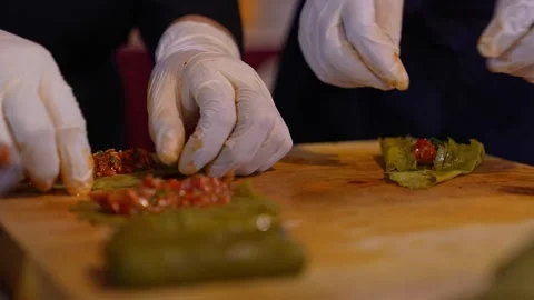 Food Preparation in Kitchen – Stuffed Vegetable Rolling Process Stock Footage 333740638
