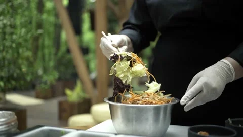 Food Preparation. Schef  Making Salad, Mixing Ingredients In Bowl Video stock 237391651