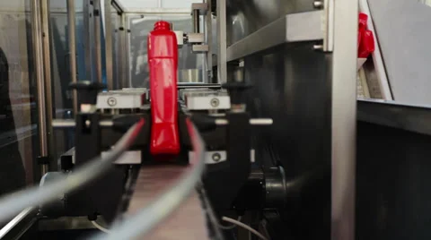 Food processing factory - setting up bottle transport machine Stock Footage 35912460