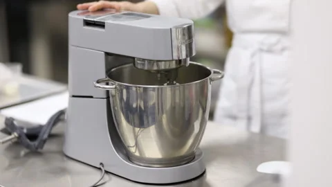 Food processor actively whipping butter cream Stock Footage 121035874