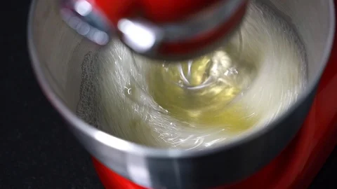 Food processor beat the eggs white egg whites into a thick foam. Stock Footage 126567023