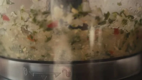 Food processor blender mix vegetable spice kitchen appliance close up Stock Footage 149933335