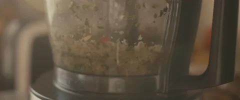 Food processor blender mix vegetable kitchen appliance close up flare Stock Footage 150304356