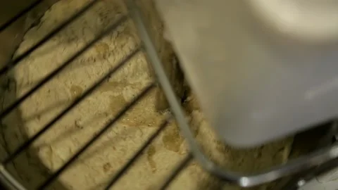 Food processor kneading dough for buns and croissants professional equipment for Stock Footage 143401938