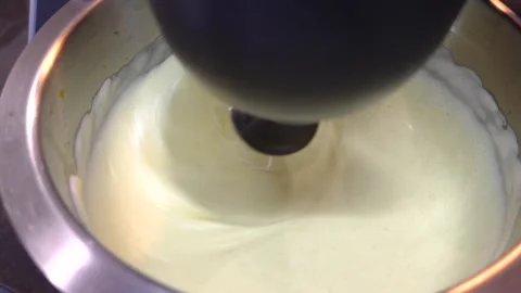 Food processor mixing cake dough in a metal bowl. Stock Footage 287815444