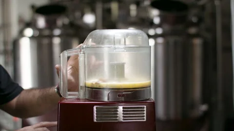 A food processor turns on and prepares a sauce for a new and delicious dish. Stock Footage 134503765