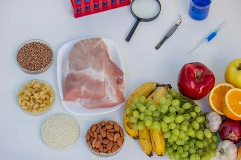 Food Quality Testing: Microscope and Fresh Fruits and Vegetables Stock Photos