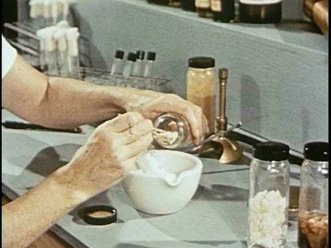 Food samples are tested in an Air Force base lab for salmonella in the 1950s. Stock Footage 75276470
