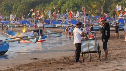 Food seller on beach in Pangandaran Java Indonesia Stock Footage 81919992