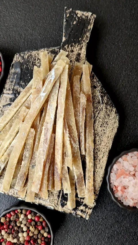 Food, snacks or jerky made from dried dehydrated salted fish with spices. Snacks Stock Footage 311320535