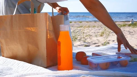 Food snacks in plastic containers, beach picnic concept Stock Footage 111576576