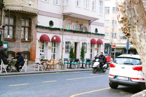Food supplier rides a motorcycle. Istanbul, 4 February 2019. Stock Photos