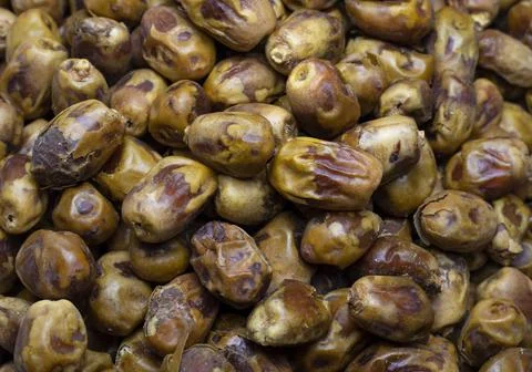 Food texture background of dried dates, top view. Stock Photos