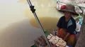 Food vendor in Pattaya floating market. HD Footage
