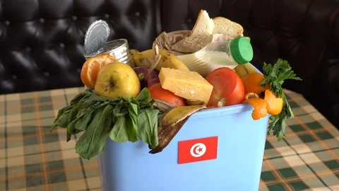 Food waste in Trash Can. The problem of food waste in Tunisia Stock Footage 105566869