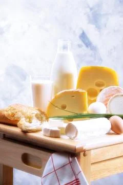 Foodstill with cheese, eggs and milk Stock Photos