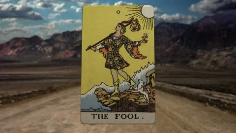 The Fool tarot card blown down a path beginning journey - loop (00) HD Stock Footage 151677854