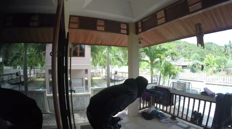 Foolish Thief Stealing House, Fail and Look in Hidden Camera. 4K Video stock 67488107