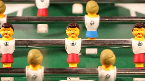 Foosball Player - Zoom in Close Up Stock Footage 136668754