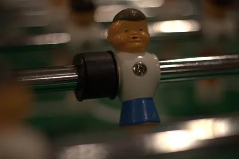 Foosball table player close up view Stock Photos