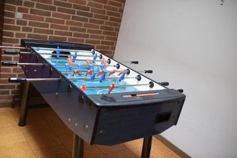 Foosball table in a school for students Stock Photos