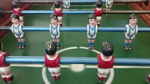 Foosball table soccer. A table soccer game. Action. Team Sports in Foosball game Stock Footage 249409425