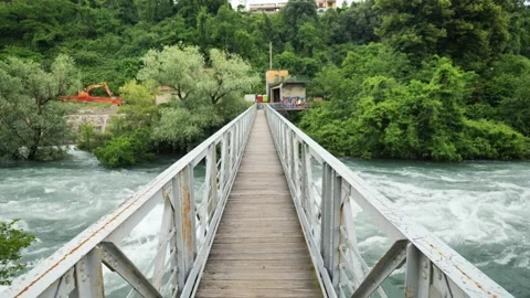 Foot bridge on Adda river Stock Footage 132396129